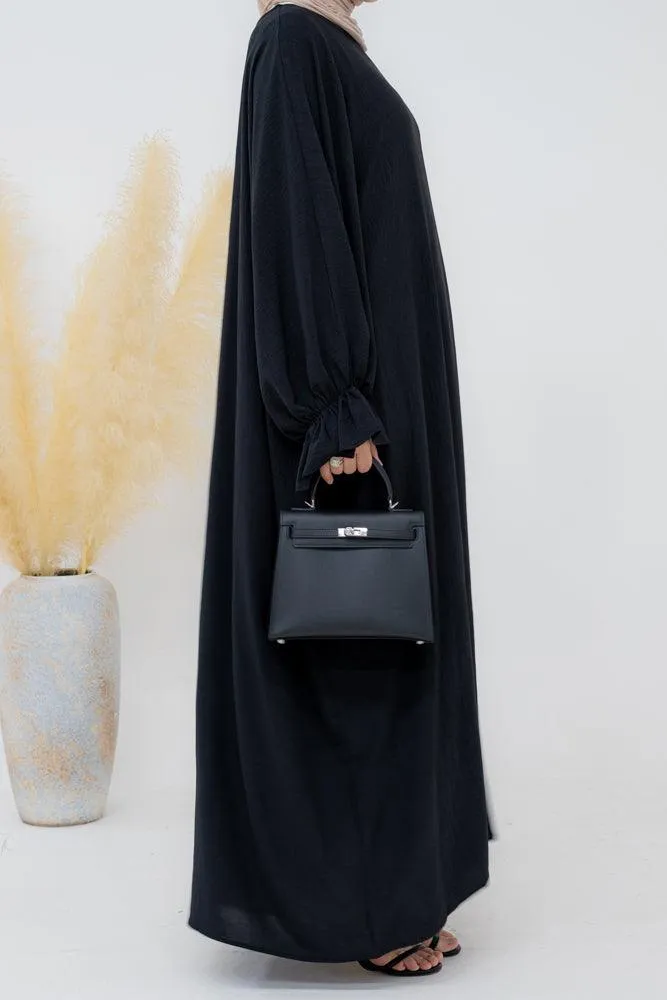 Radwa batwing abaya with ruched sleeve and loose cut in black